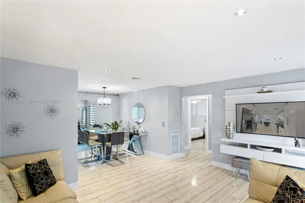 a living room with furniture and a table