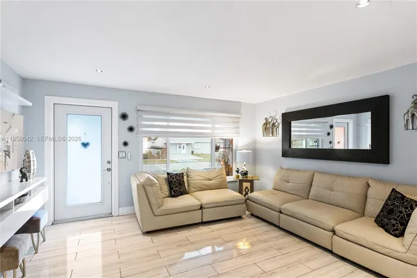 a living room with furniture and a couch