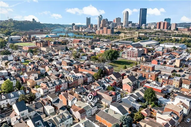 an aerial view of residential building with parking space