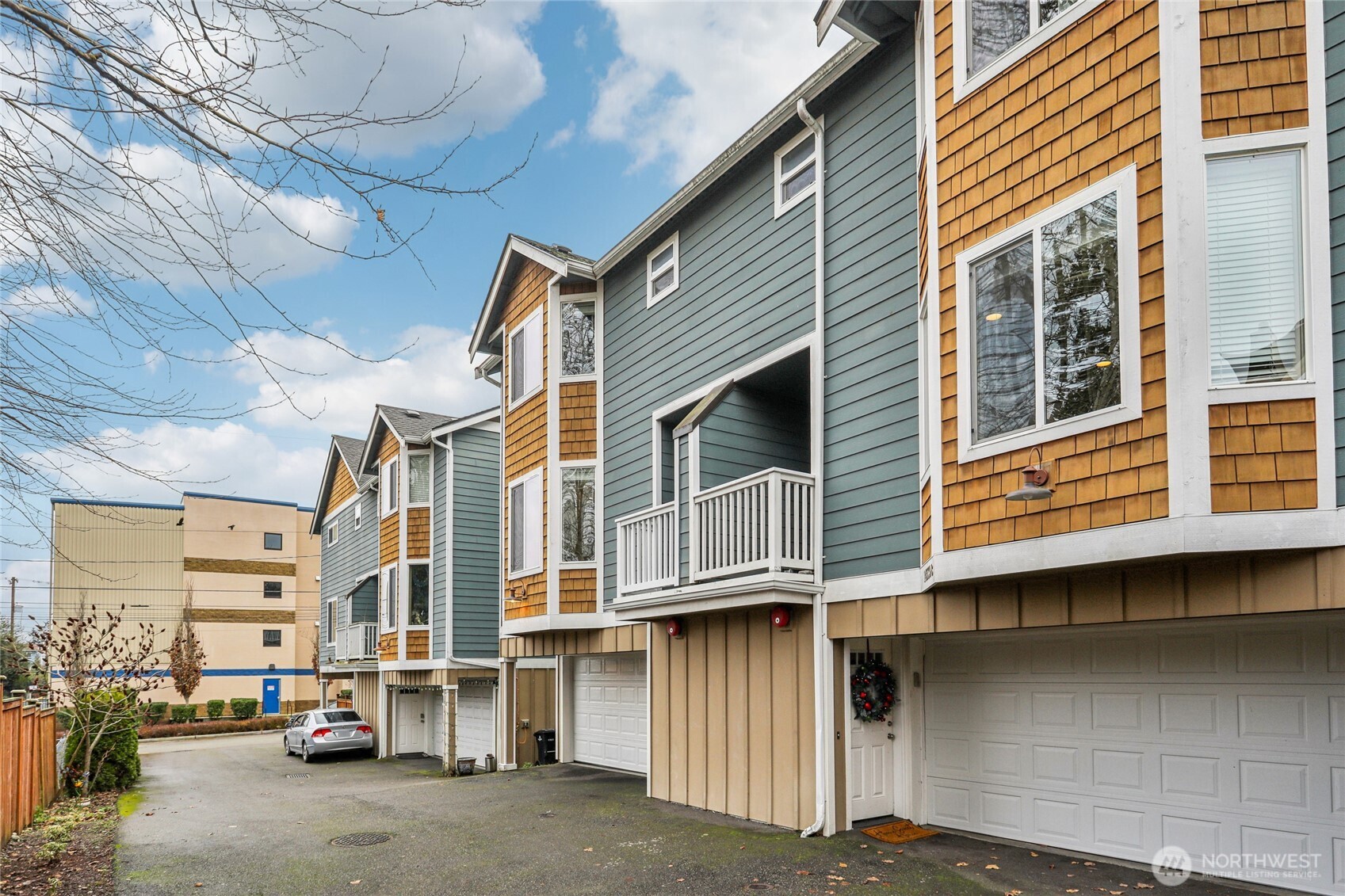 14539 32nd Avenue Northeast, Unit A Shoreline, WA 98155 - Photo 2 of 27 a view of car parked in front of building