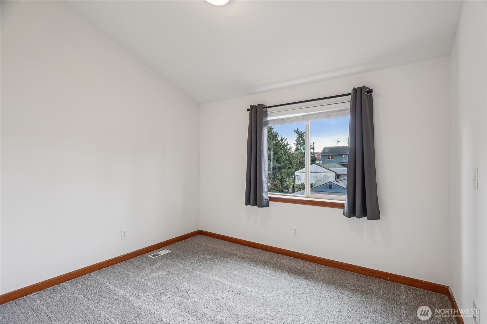 14539 32nd Avenue Northeast, Unit A Shoreline, WA 98155 - Photo 21 of 27 a view of a big room with window