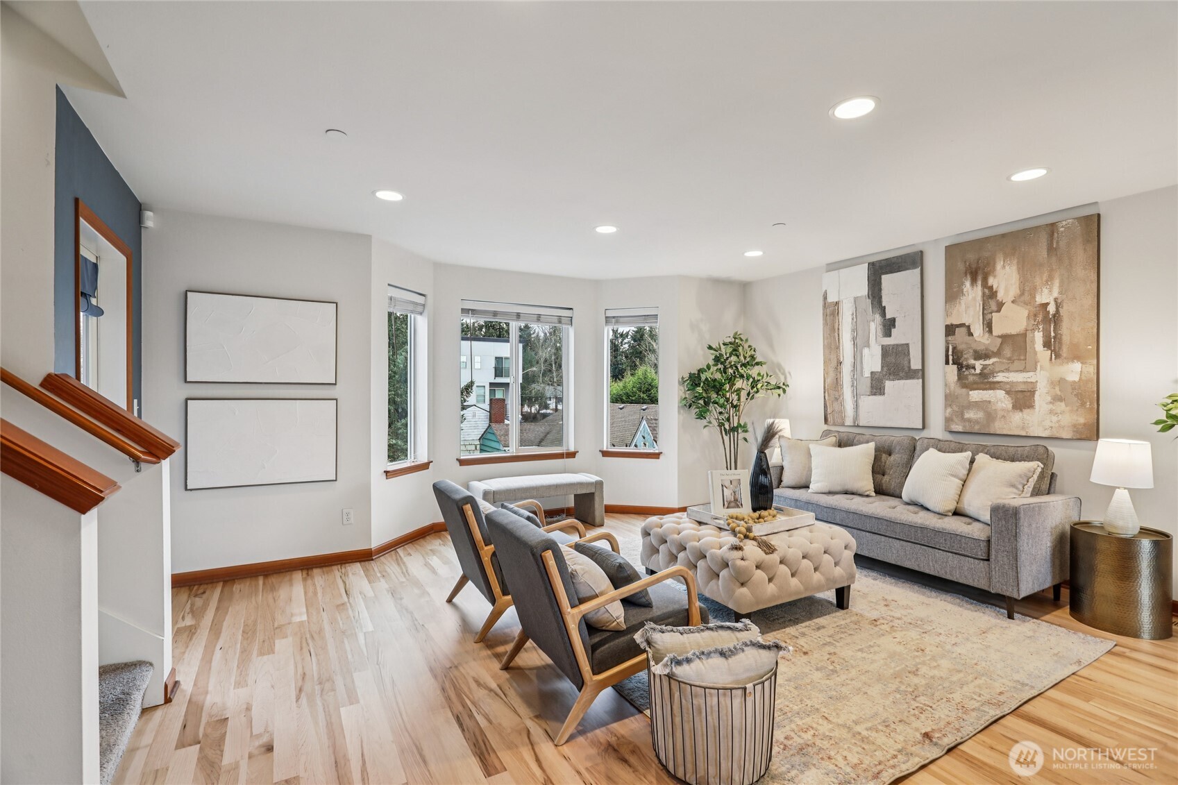 14539 32nd Avenue Northeast, Unit A Shoreline, WA 98155 - Photo 4 of 27 a living room with furniture and a wooden floor