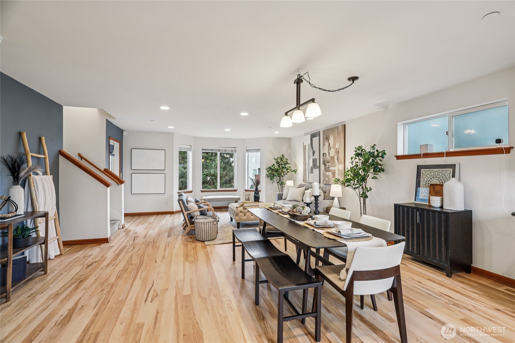 14539 32nd Avenue Northeast, Unit A Shoreline, WA 98155 - Photo 6 of 27 a view of a dining room with furniture window and wooden floor