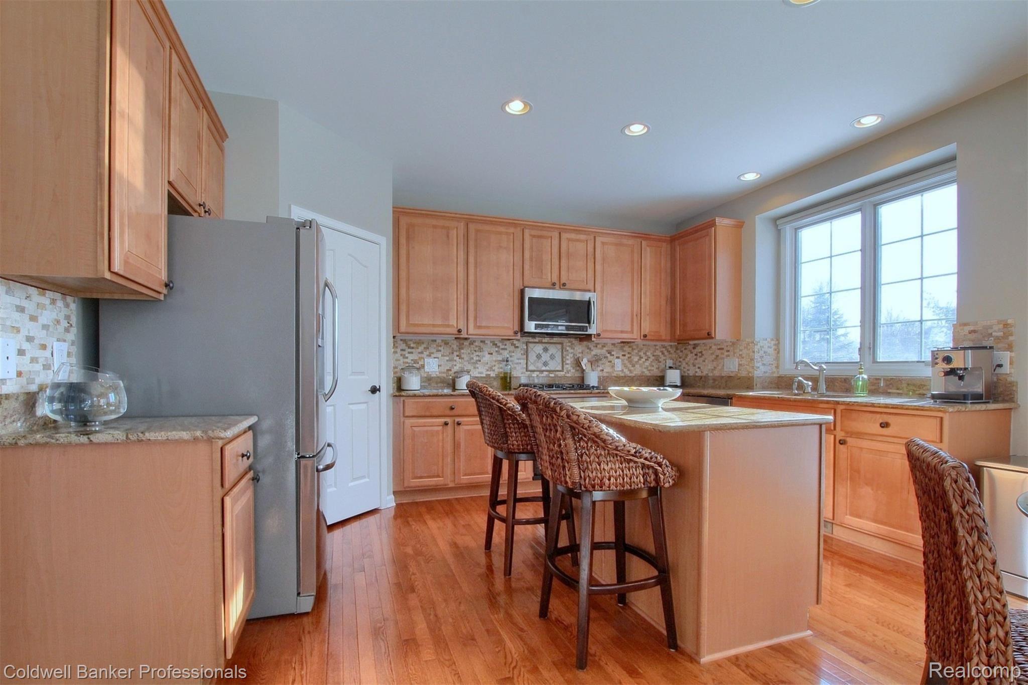 1348 Legacy Court Canton, MI 48187 - Photo 12 of 38 Kitchen w/wood flooring