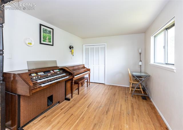 Great space attached to the living room-- perfect for an office, formal dining area, home school area, etc