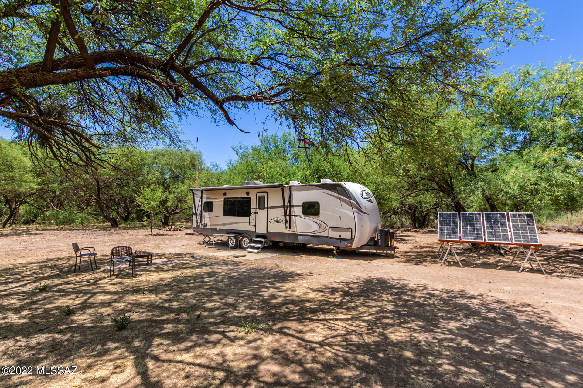 170 Bridge Road, Unit 13B Tubac, AZ 85646 - Photo 10 of 12 a view of a yard with an outdoor and a fire pit