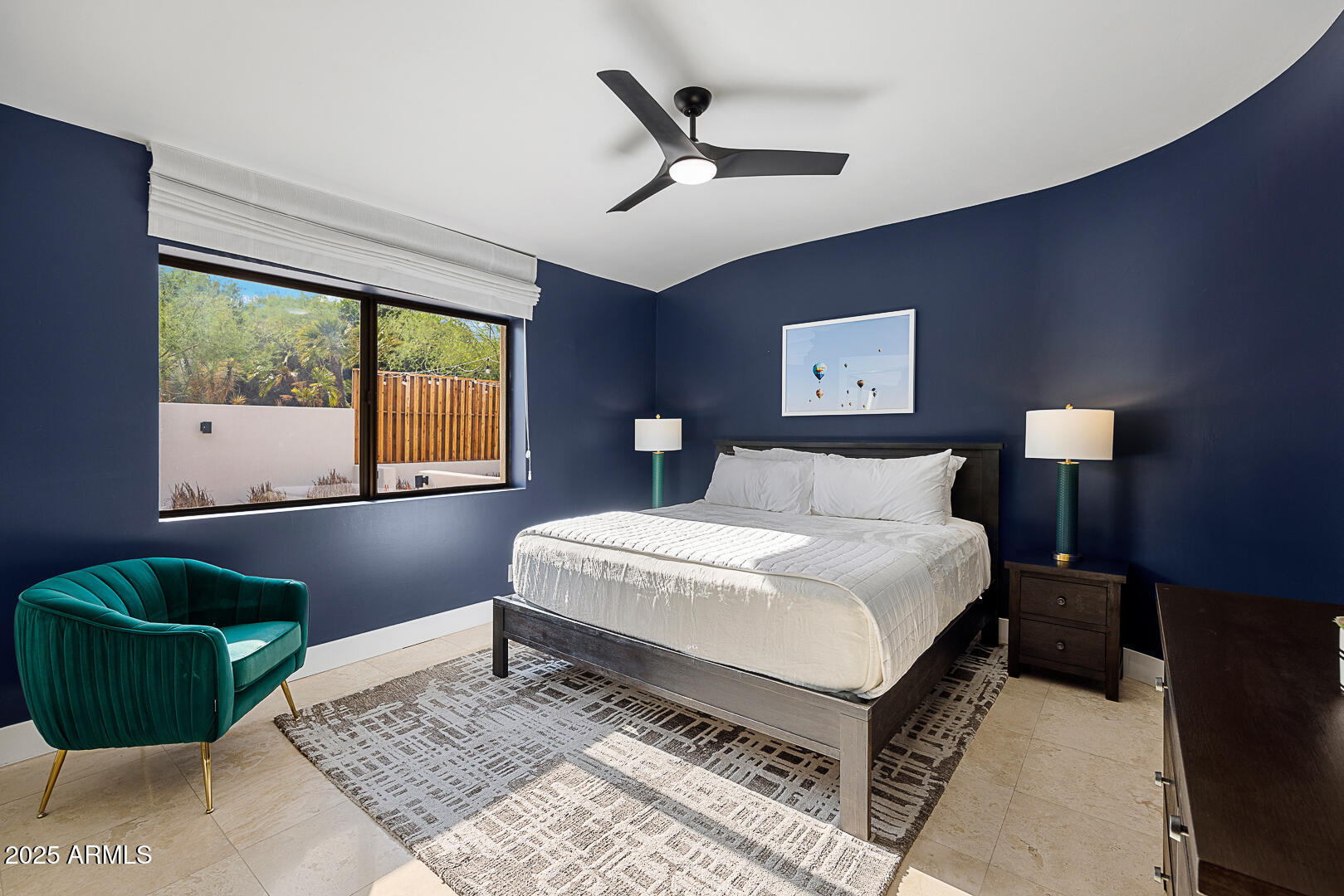 7111 North Quartz Mountain Road Paradise Valley, AZ 85253 - Photo 16 of 22 a bedroom with a bed lamp and window