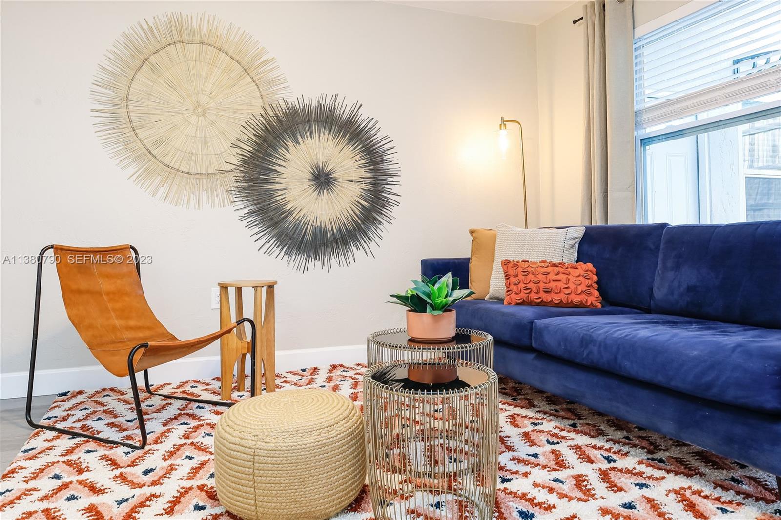 2761 Southwest 33rd Avenue, Unit 2 Miami, FL 33133 - Photo 2 of 33 a living room with furniture and a potted plant