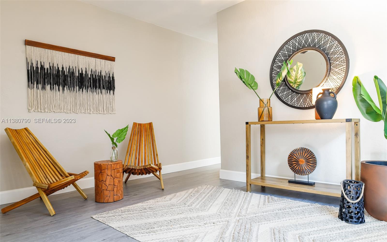 2761 Southwest 33rd Avenue, Unit 2 Miami, FL 33133 - Photo 25 of 33 a living room with furniture and a wooden floor