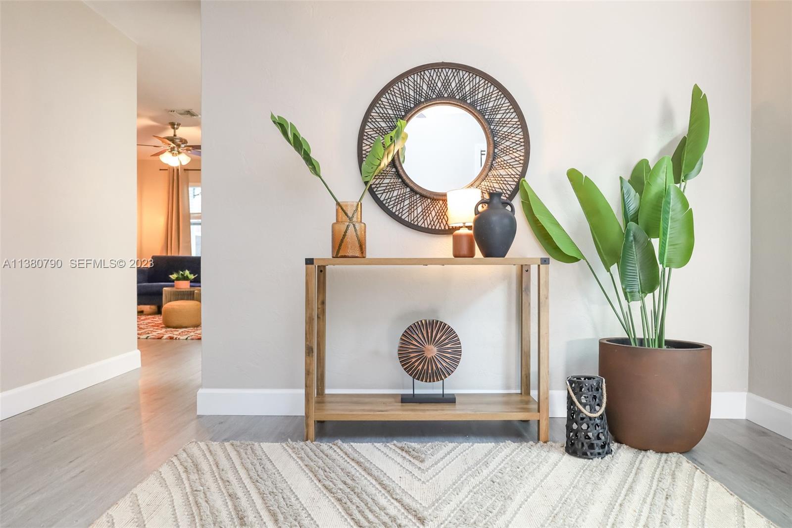 2761 Southwest 33rd Avenue, Unit 2 Miami, FL 33133 - Photo 29 of 33 a living room with furniture and a potted plant