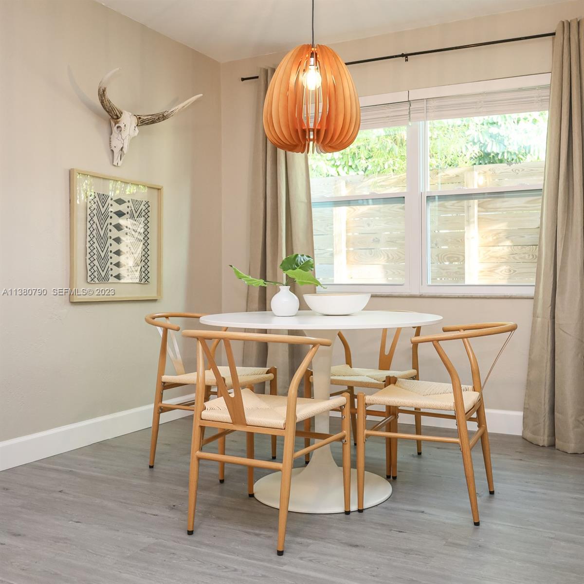 2761 Southwest 33rd Avenue, Unit 2 Miami, FL 33133 - Photo 9 of 33 a dining room table chairs and a table