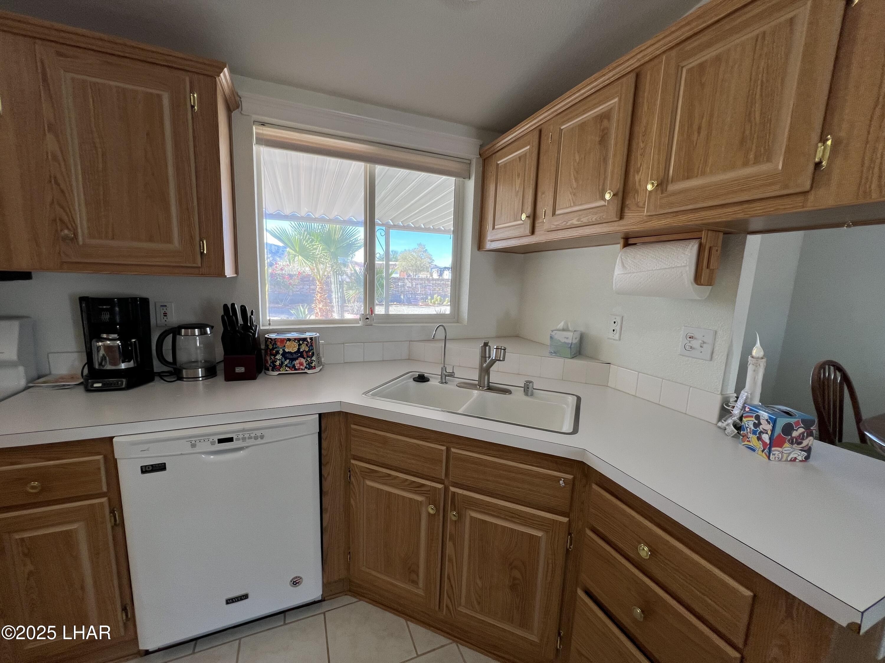 49688 Ruby Avenue Quartzsite, AZ 85346 - Photo 17 of 33 Kitchen with an abundance of cupboards, some of which have convenient pull-out drawers