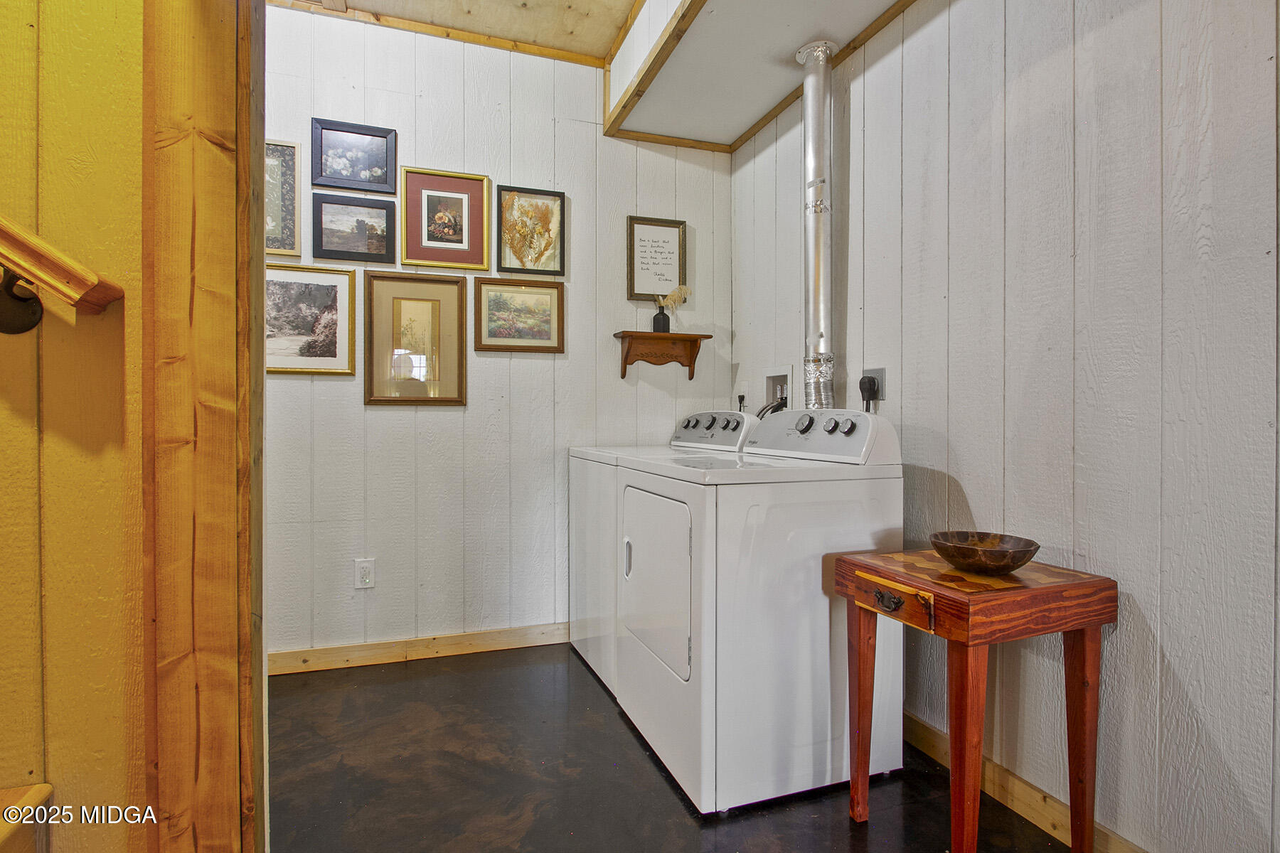 355 Dumas Road Forsyth, GA 31029 - Photo 16 of 53 a utility room with dryer and washer