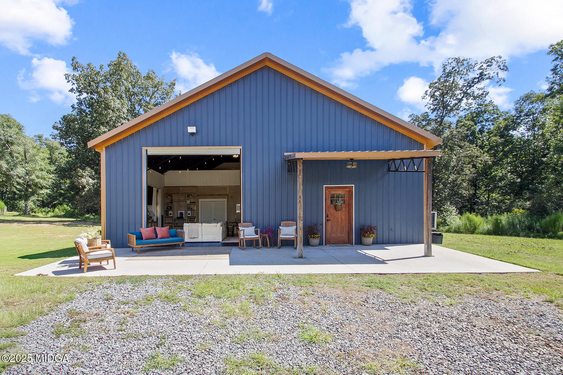 355 Dumas Road Forsyth, GA 31029 - Photo 2 of 53 a view of a house with backyard and porch