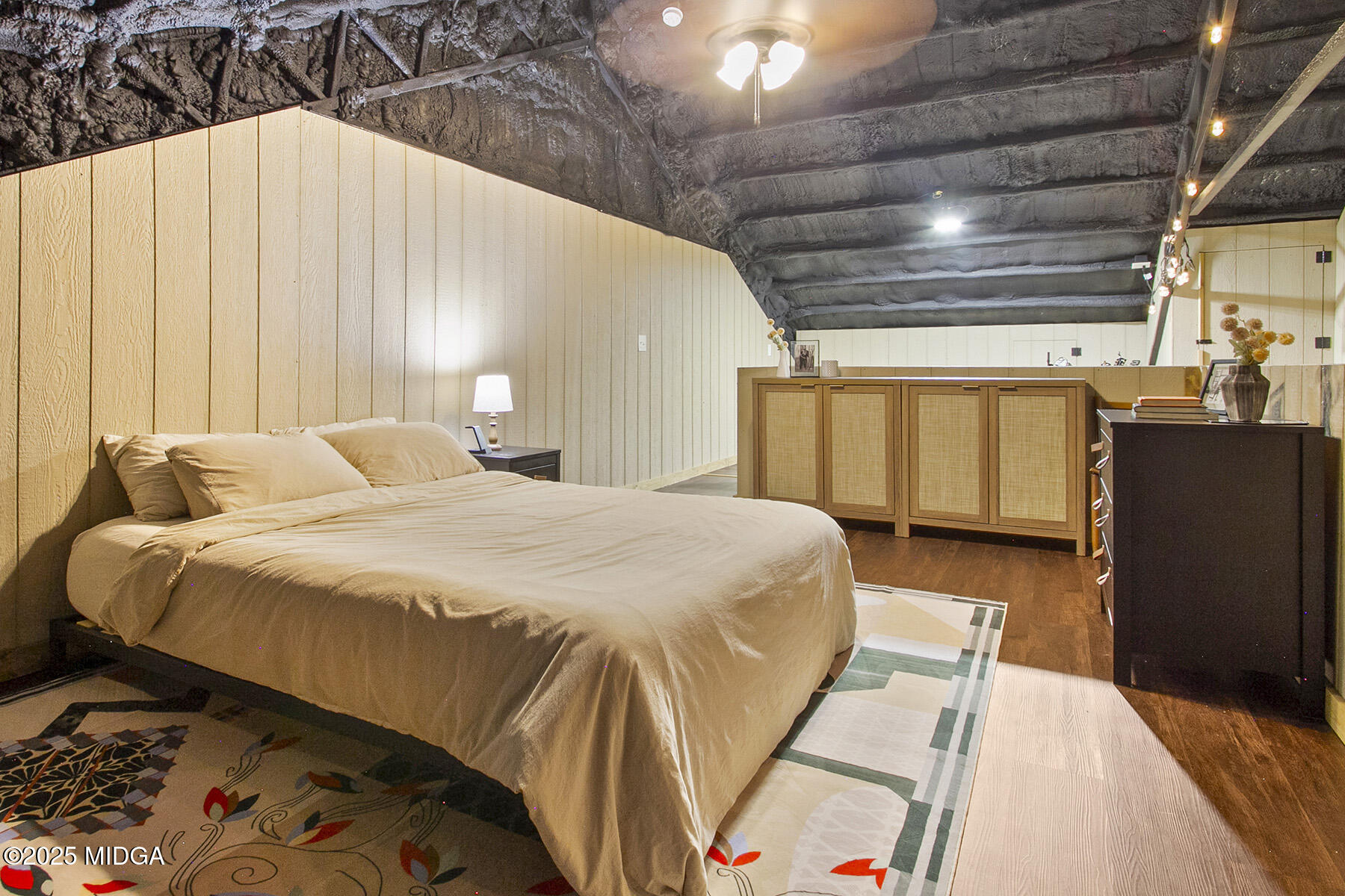 355 Dumas Road Forsyth, GA 31029 - Photo 25 of 53 a bed sitting in a bedroom next to a window