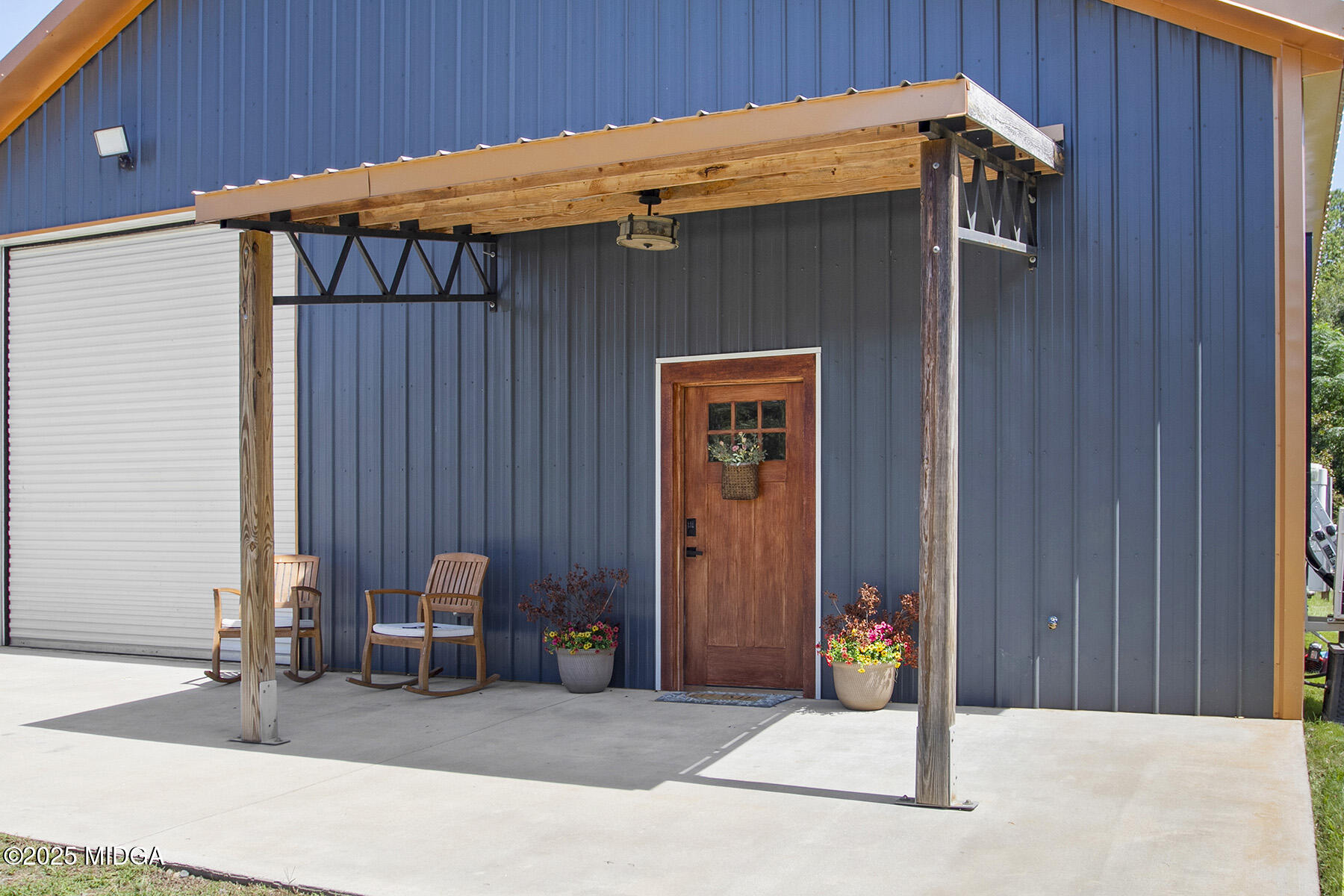 355 Dumas Road Forsyth, GA 31029 - Photo 3 of 53 a backyard of a house with table and chairs