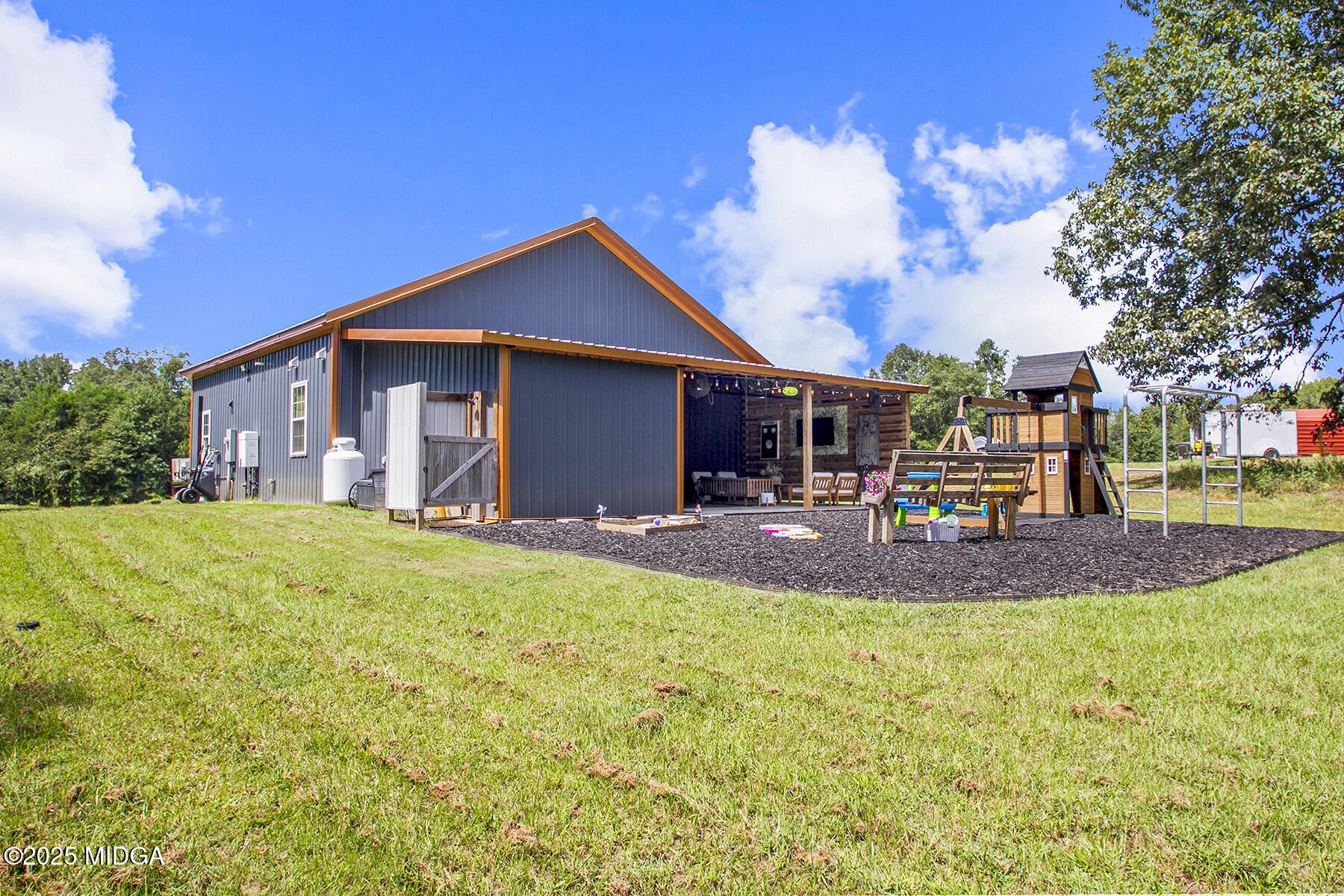 355 Dumas Road Forsyth, GA 31029 - Photo 36 of 53 a view of a house with backyard and tree s