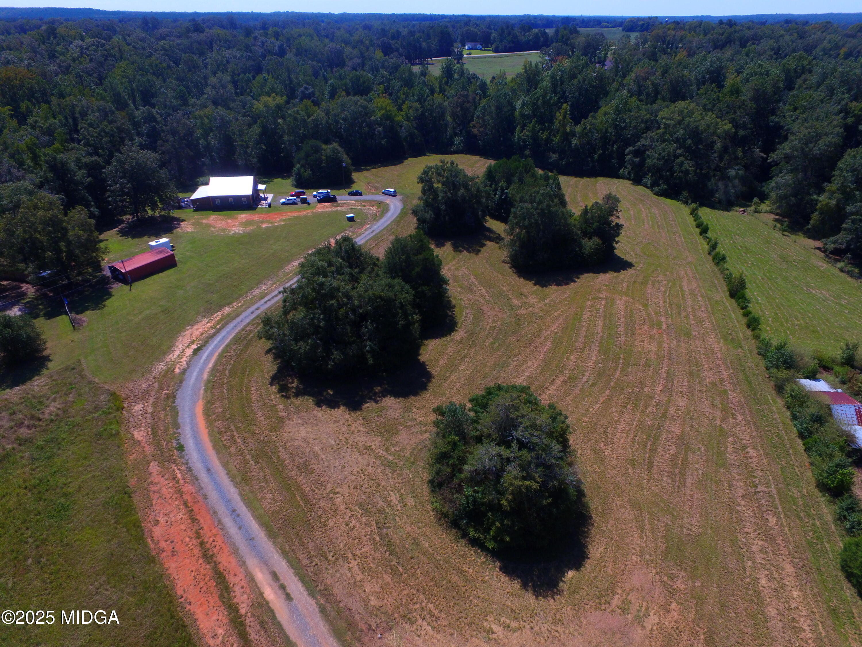 355 Dumas Road Forsyth, GA 31029 - Photo 38 of 53 a view of outdoor space and garden