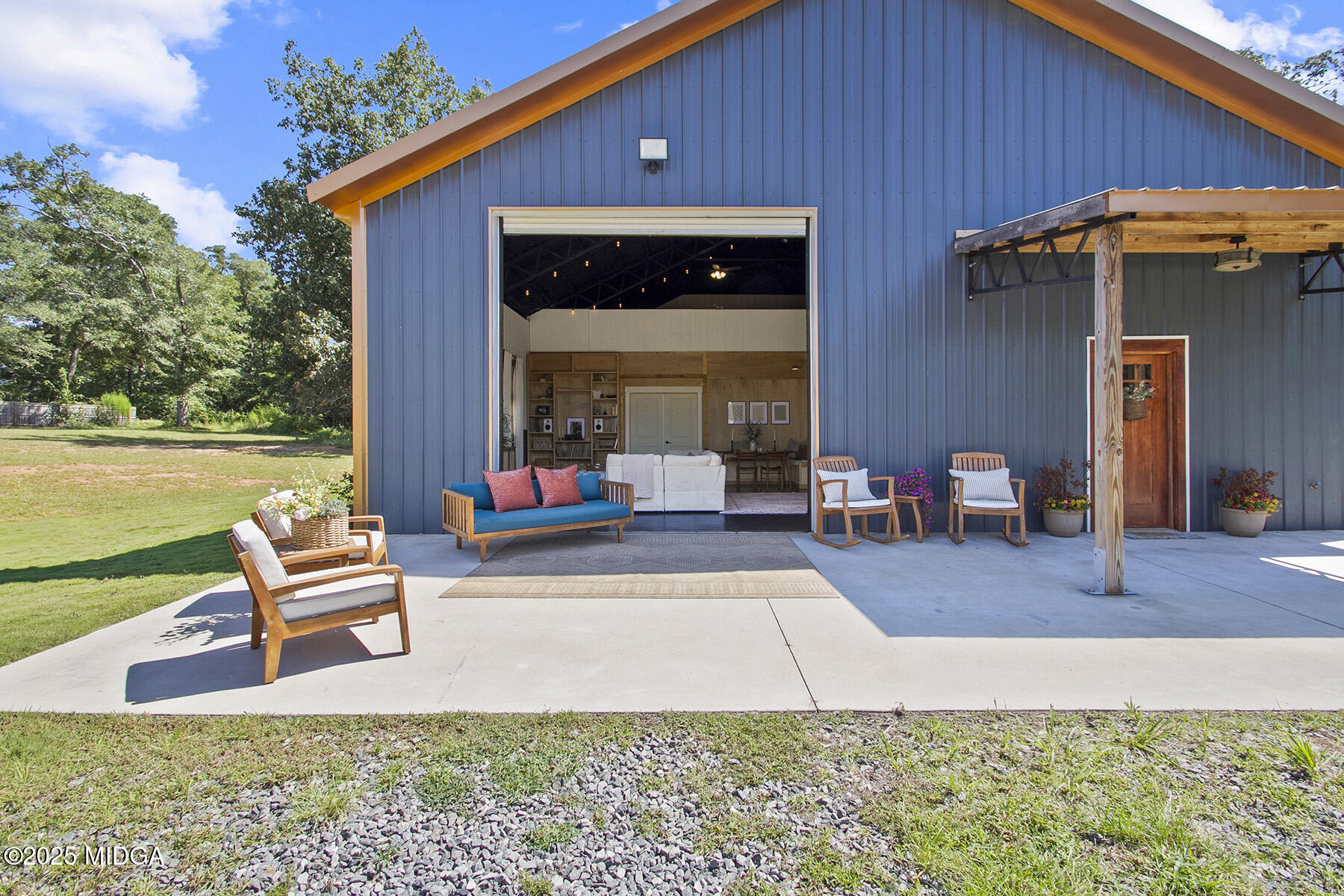 355 Dumas Road Forsyth, GA 31029 - Photo 4 of 53 a view of a chair in wooden deck