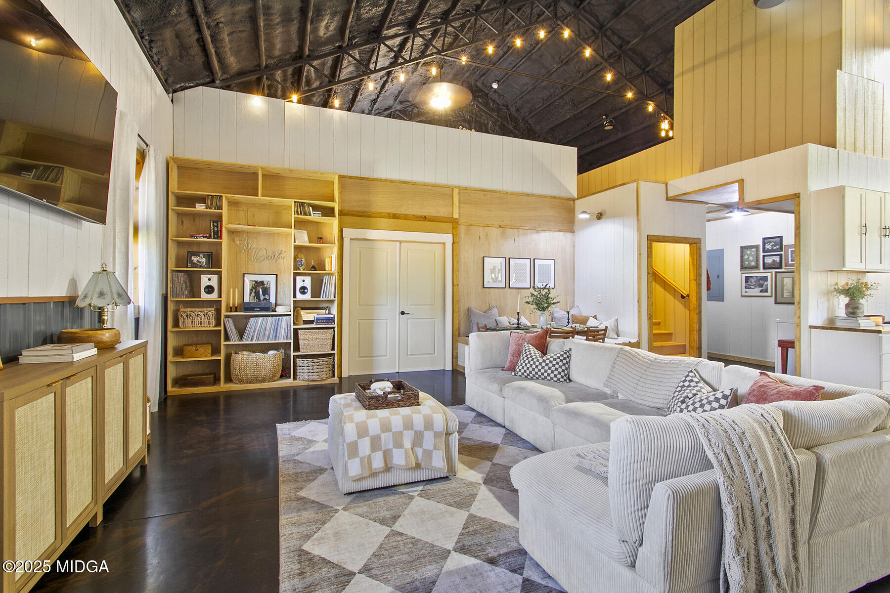 355 Dumas Road Forsyth, GA 31029 - Photo 8 of 53 a large bedroom with a bed and wooden floor