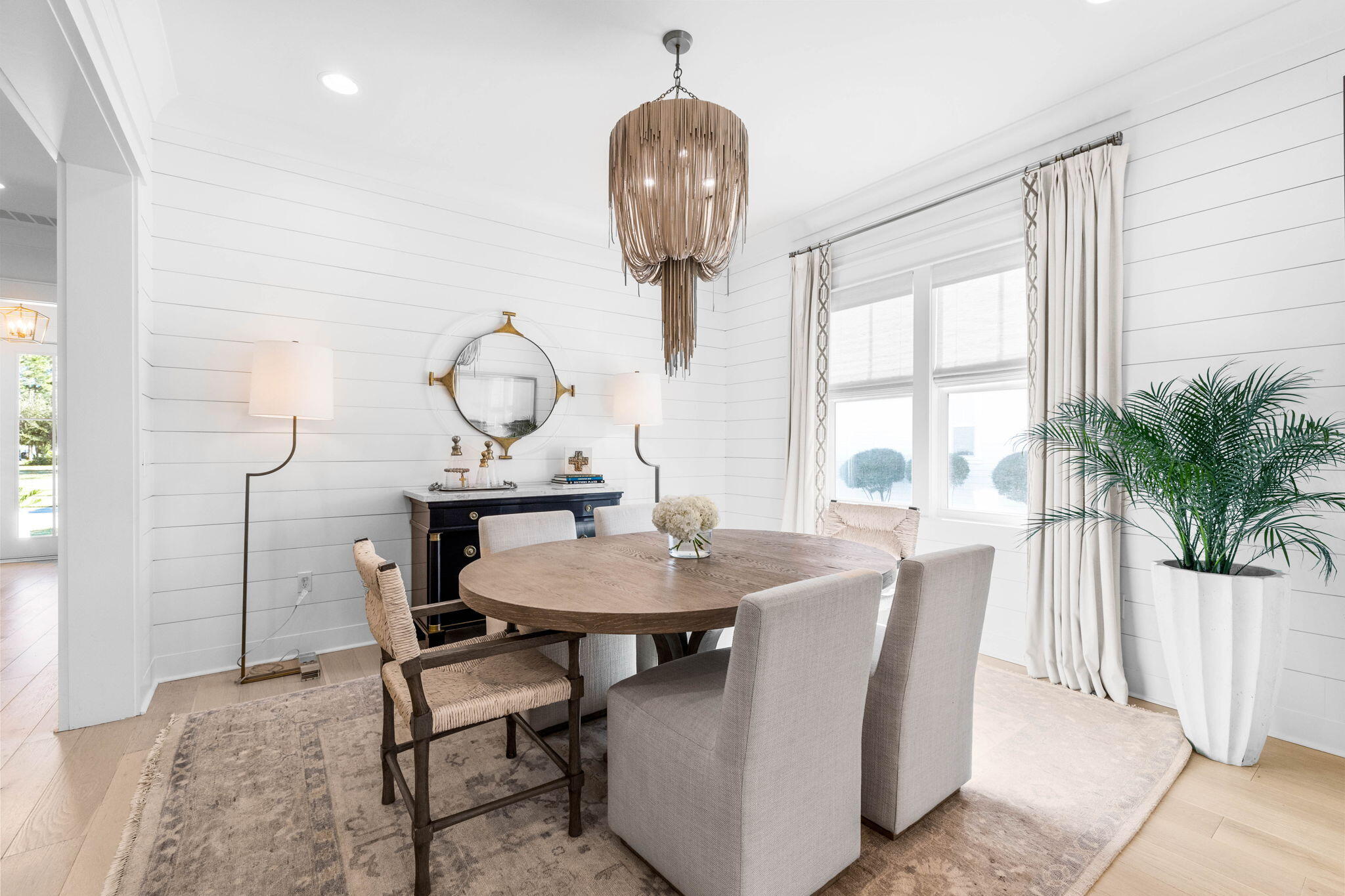 Undisclosed Address Watersound, FL 32461 - Photo 25 of 94 a view of a dining room with furniture window and outside view