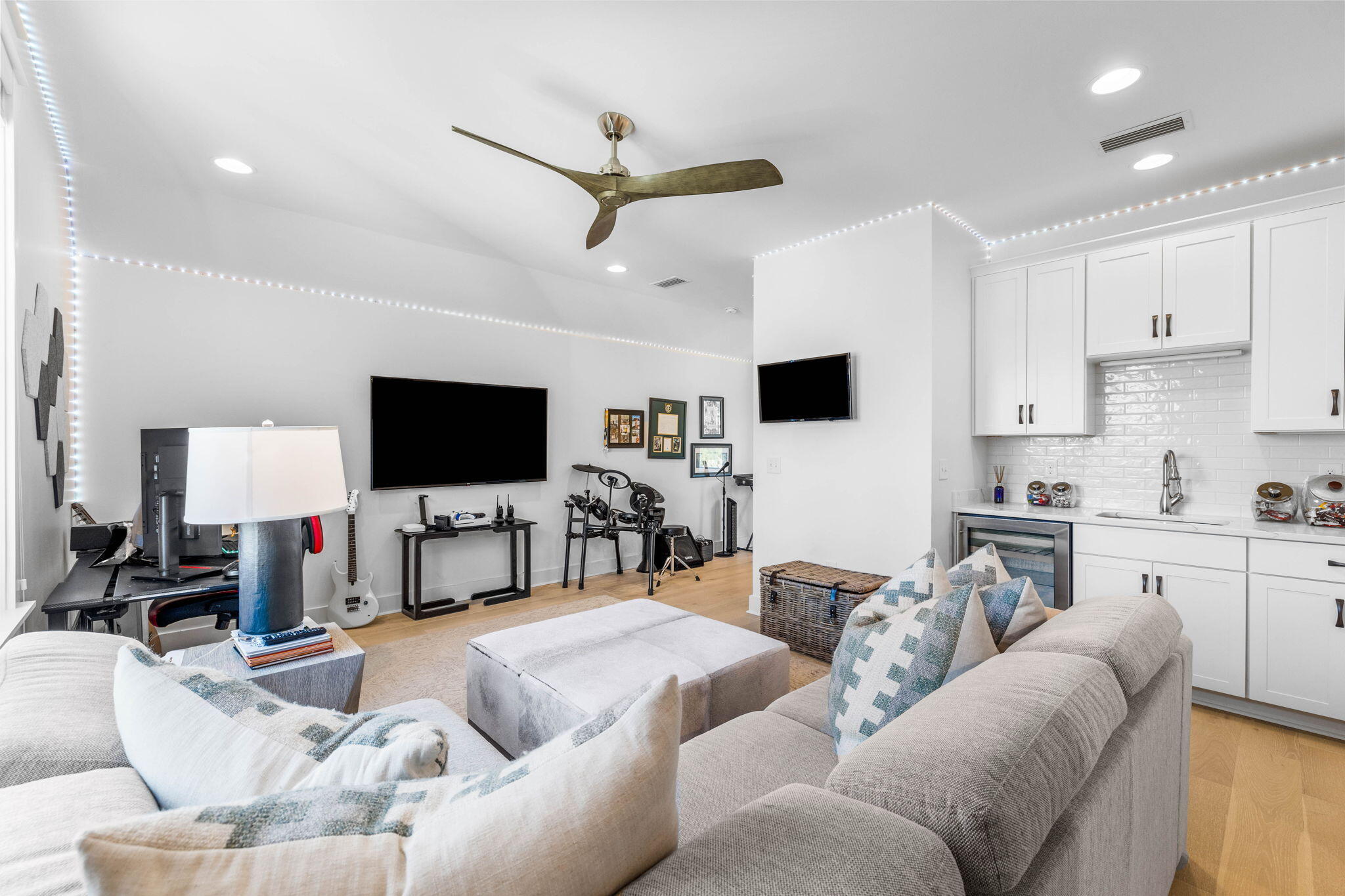 Undisclosed Address Watersound, FL 32461 - Photo 52 of 94 a living room with furniture and a flat screen tv
