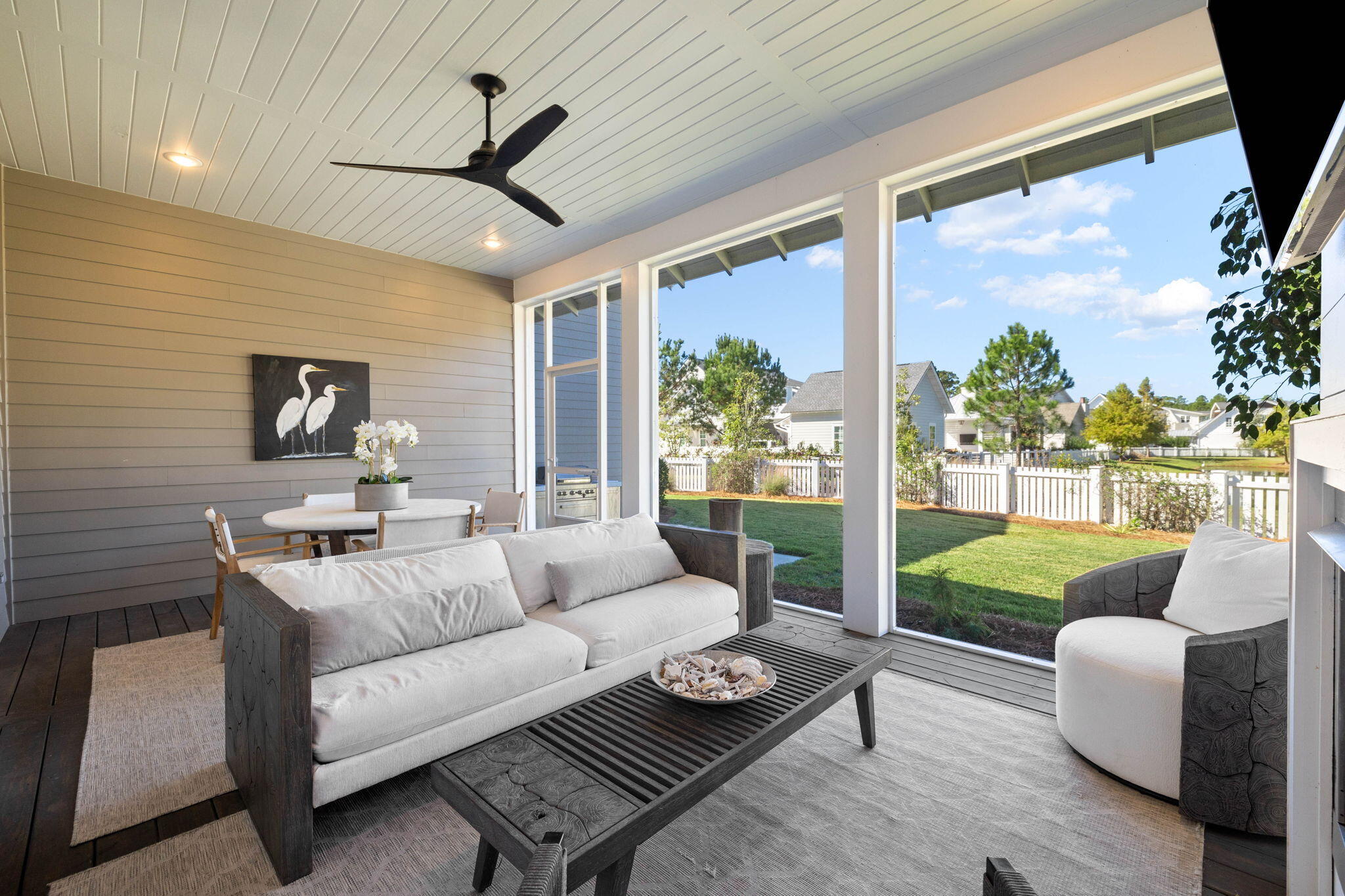 Undisclosed Address Watersound, FL 32461 - Photo 56 of 94 a living room with furniture and a large window