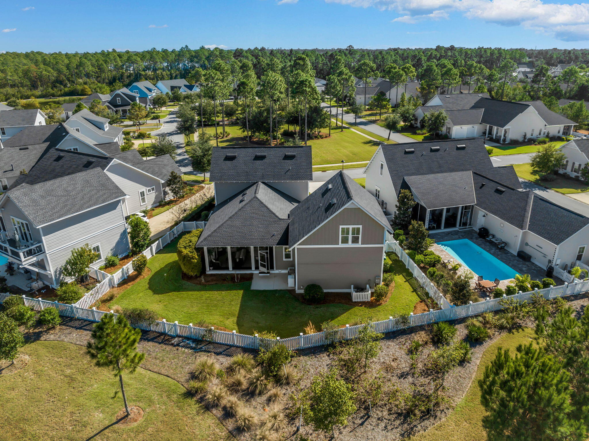 Undisclosed Address Watersound, FL 32461 - Photo 70 of 94 an aerial view of a house with a garden potted plants
