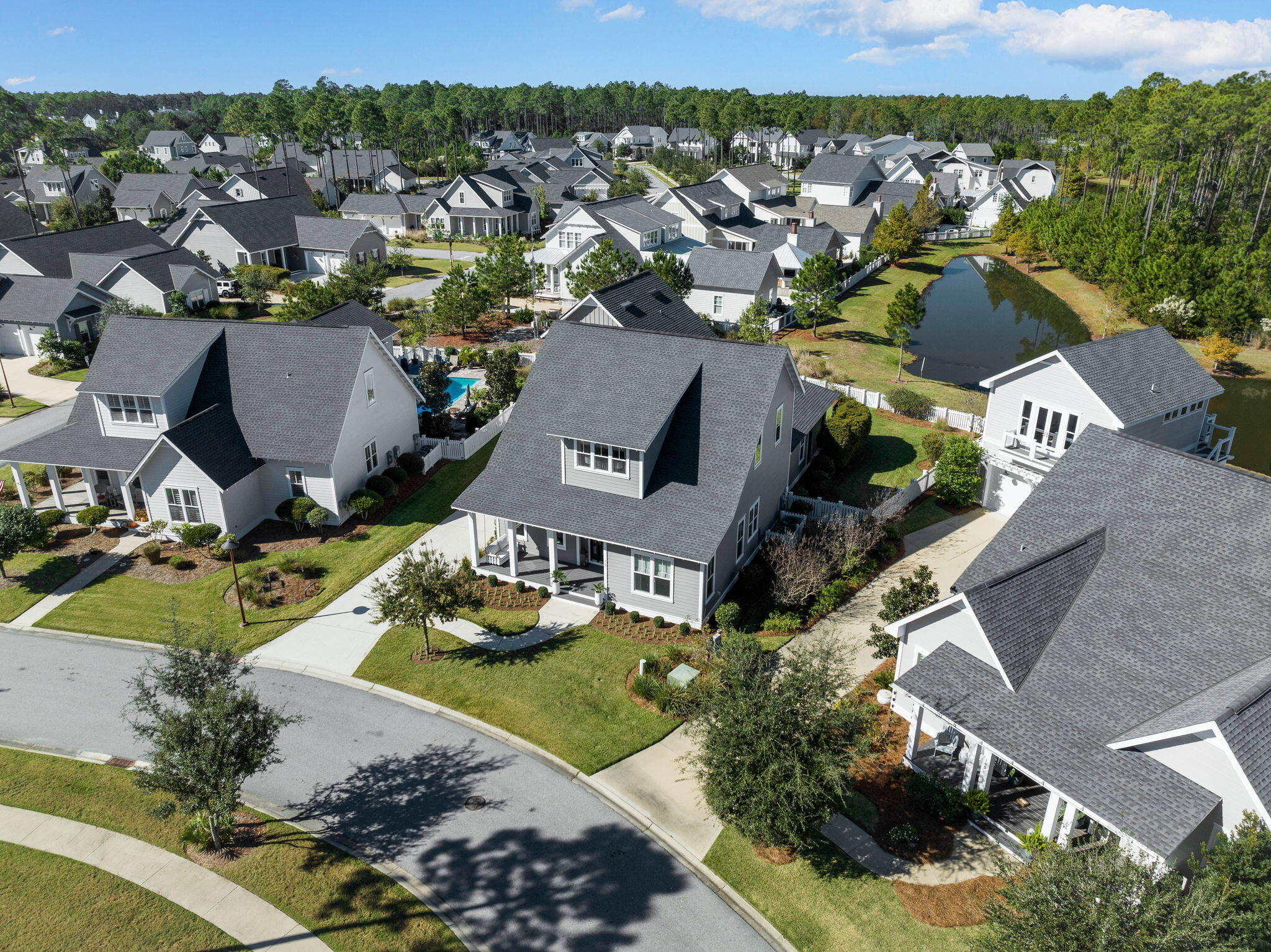 Undisclosed Address Watersound, FL 32461 - Photo 78 of 94 an aerial view of a house with a garden