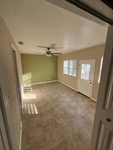 an empty room with windows