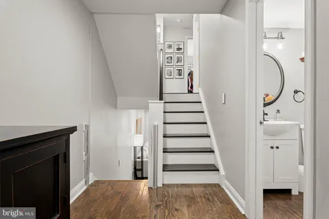 a bedroom with a bed a desk and chair