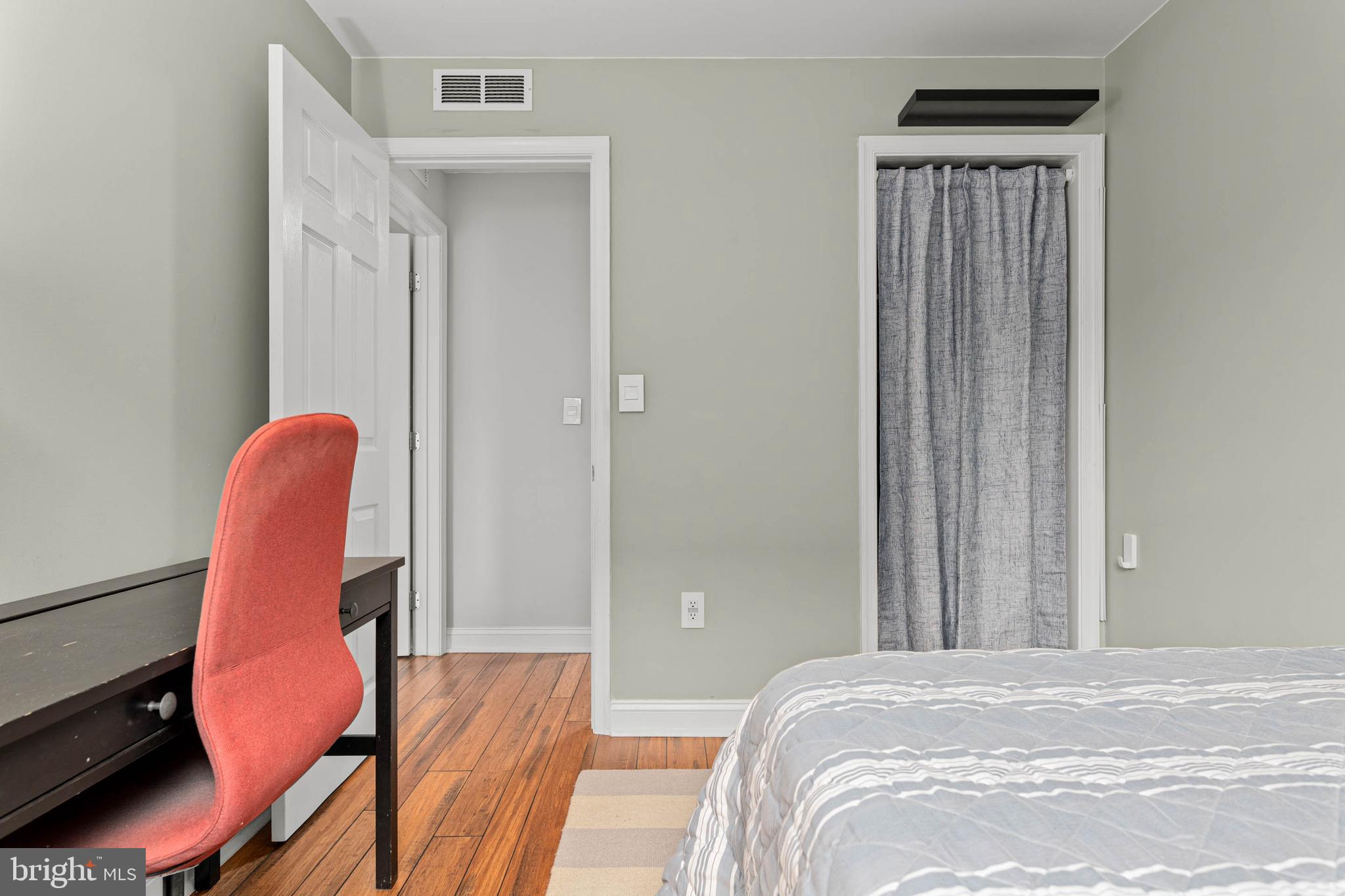 2330 Fairmount Avenue, Unit A Philadelphia, PA 19130 - Photo 16 of 34 a bedroom with a bed a desk and chair