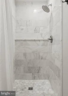 a view of kitchen with furniture and wooden floor