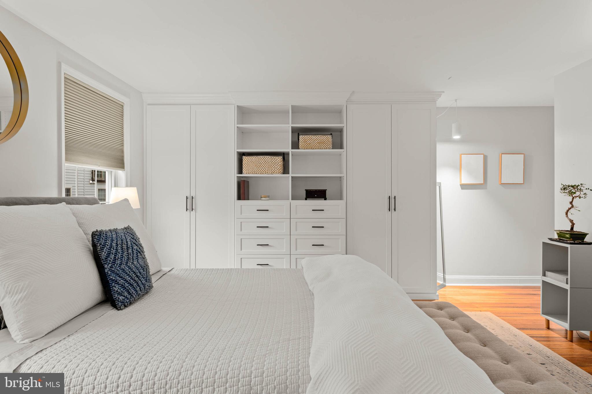 2330 Fairmount Avenue, Unit A Philadelphia, PA 19130 - Photo 23 of 34 a bedroom with a bed and a cabinets