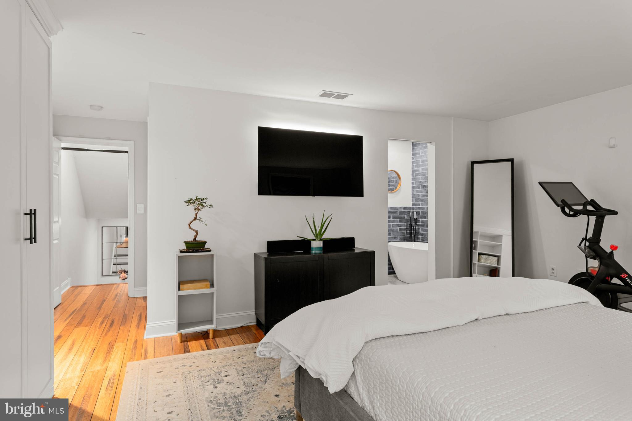 2330 Fairmount Avenue, Unit A Philadelphia, PA 19130 - Photo 24 of 34 a bedroom with a bed and a flat screen tv