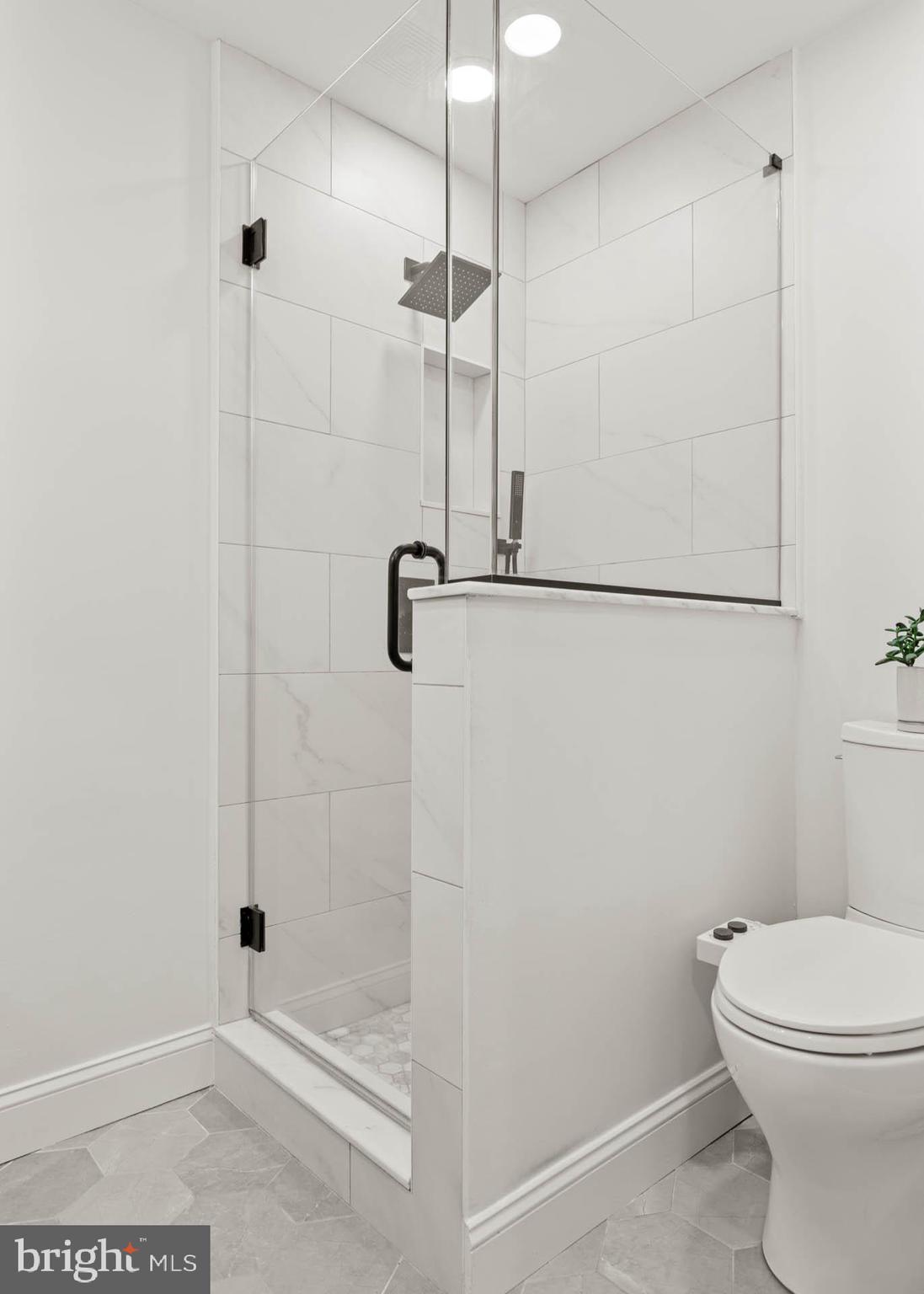 2330 Fairmount Avenue, Unit A Philadelphia, PA 19130 - Photo 27 of 34 a bathroom with a shower a toilet and a shower