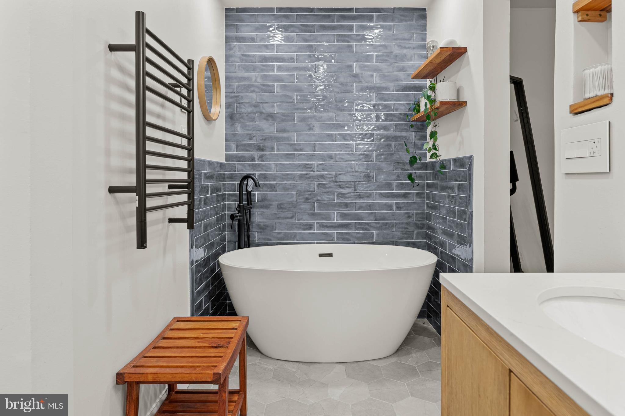 2330 Fairmount Avenue, Unit A Philadelphia, PA 19130 - Photo 28 of 34 a bathroom with a sink and a mirror