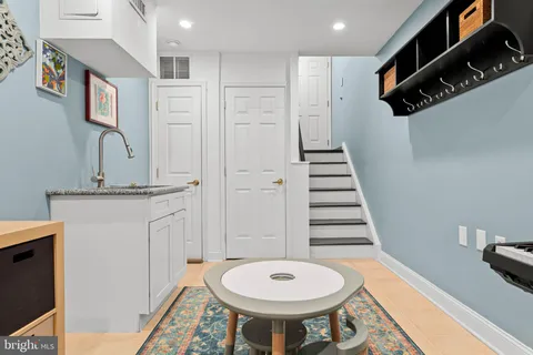 a view of a building with a yard