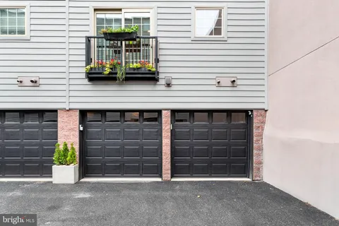 a view of building with parking area