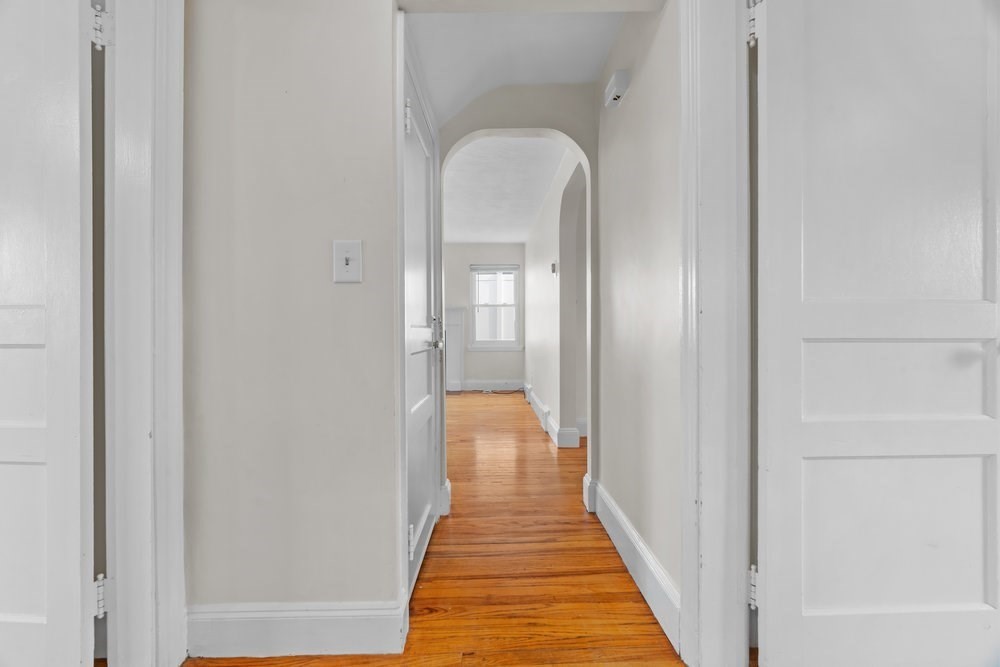 12 Pershing Road Newton, MA 02465 - Photo 17 of 29 a view of a bathroom from the hallway