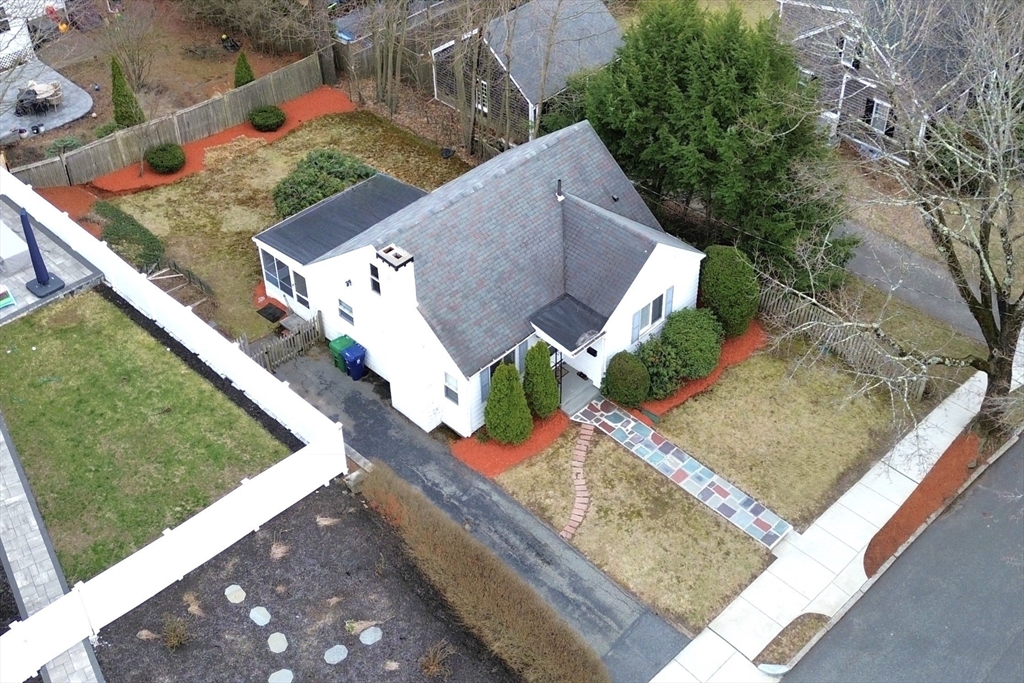 12 Pershing Road Newton, MA 02465 - Photo 26 of 29 a view of a house with a yard
