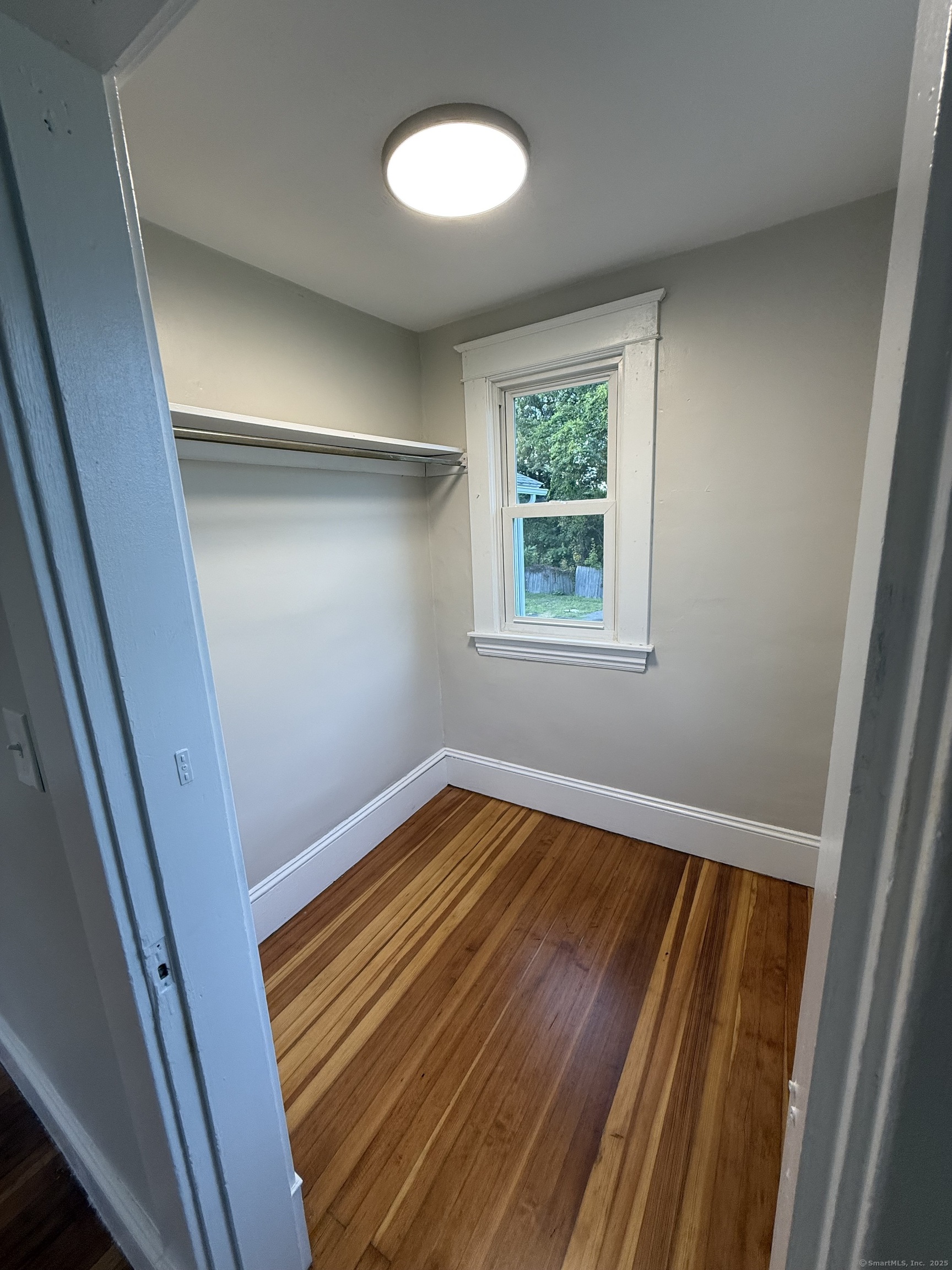 820 Burbank Avenue Suffield, CT 06078 - Photo 11 of 15 a view of empty room with window