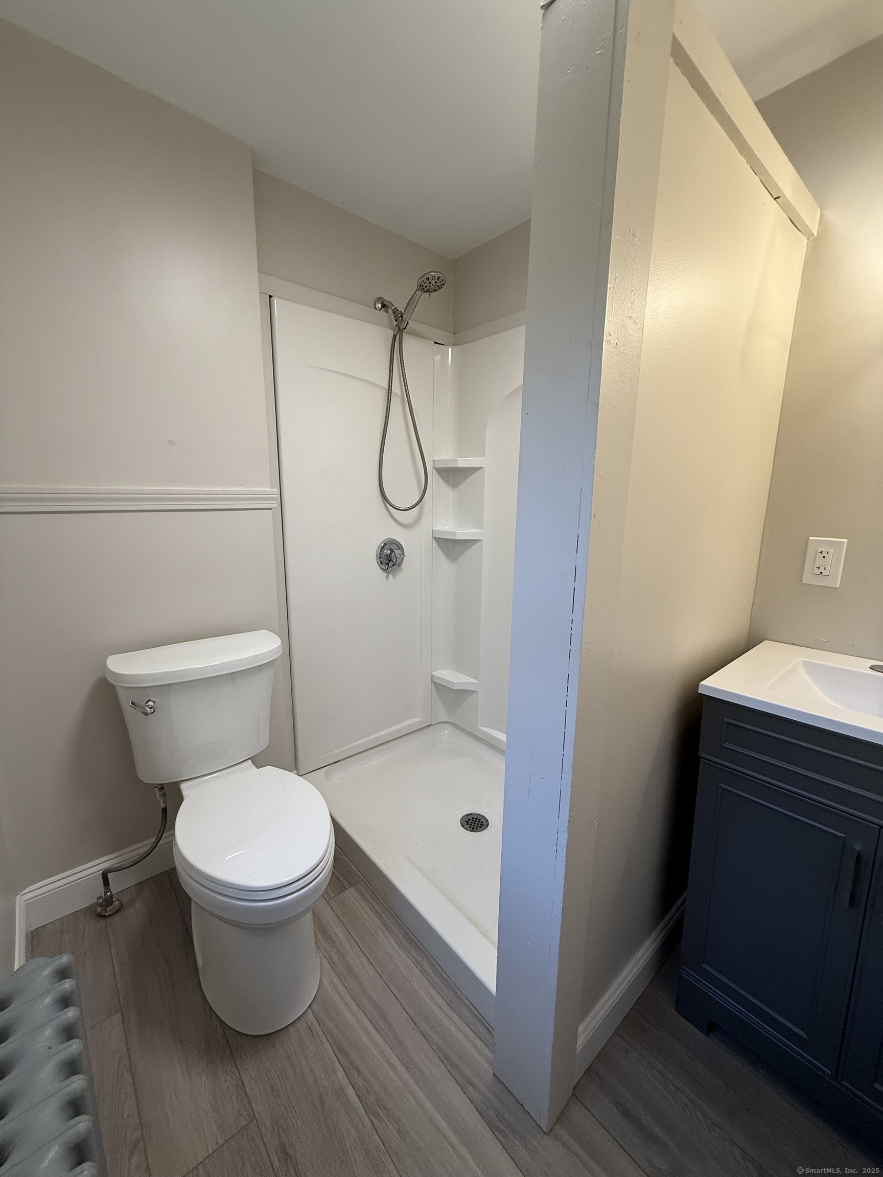820 Burbank Avenue Suffield, CT 06078 - Photo 12 of 15 a bathroom with a toilet and a shower