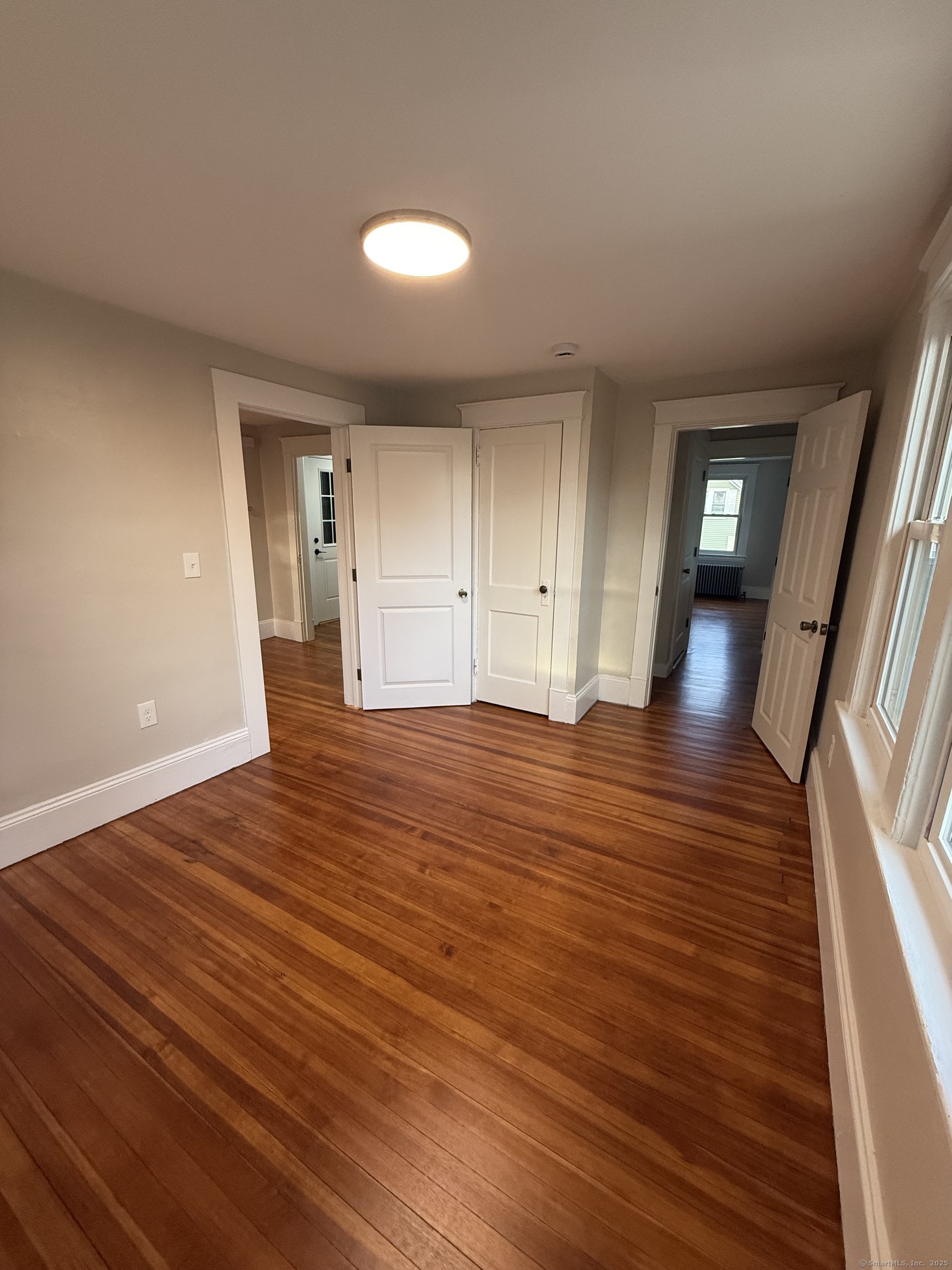 820 Burbank Avenue Suffield, CT 06078 - Photo 9 of 15 a view of a livingroom with wooden floor