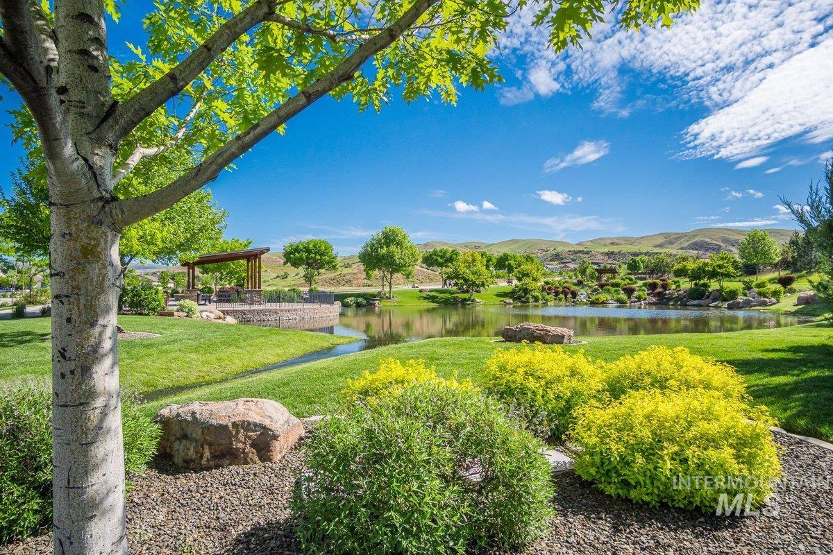 5668 West Old Ranch Street Boise, ID 83714 - Photo 41 of 44 View of grassy yard with a water and mountain view