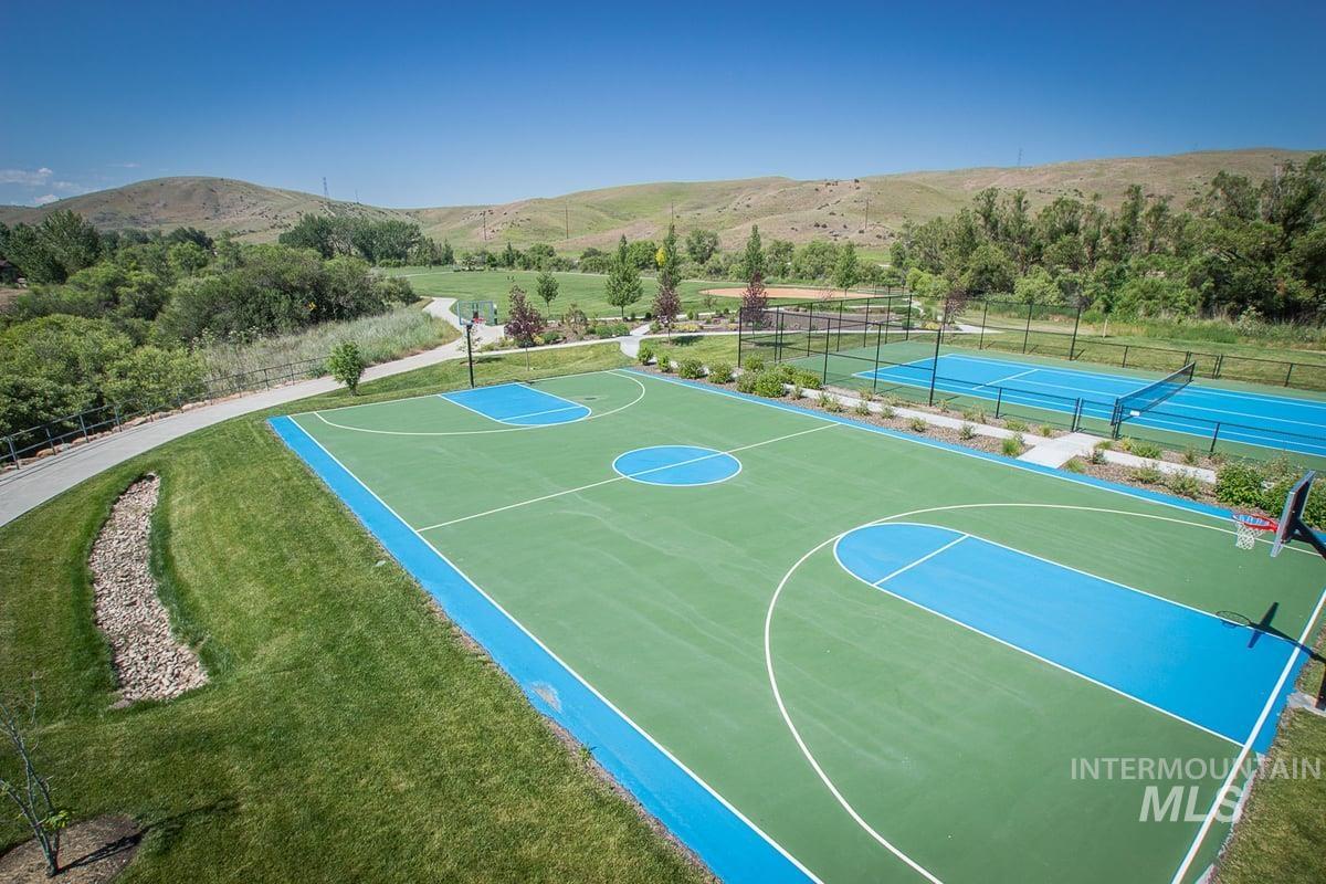 5668 West Old Ranch Street Boise, ID 83714 - Photo 43 of 44 View of basketball court with community basketball court, a tennis court, and a mountain view