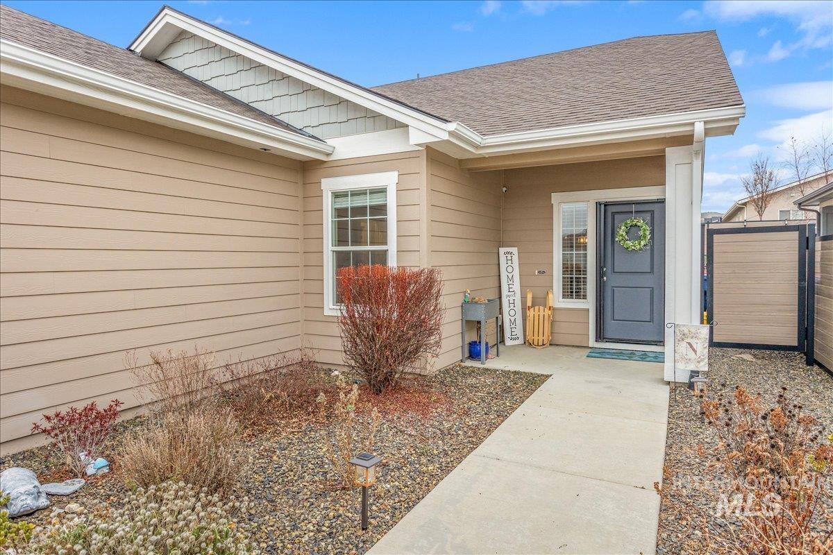 5668 West Old Ranch Street Boise, ID 83714 - Photo 5 of 44 Entrance to property with roof with shingles
