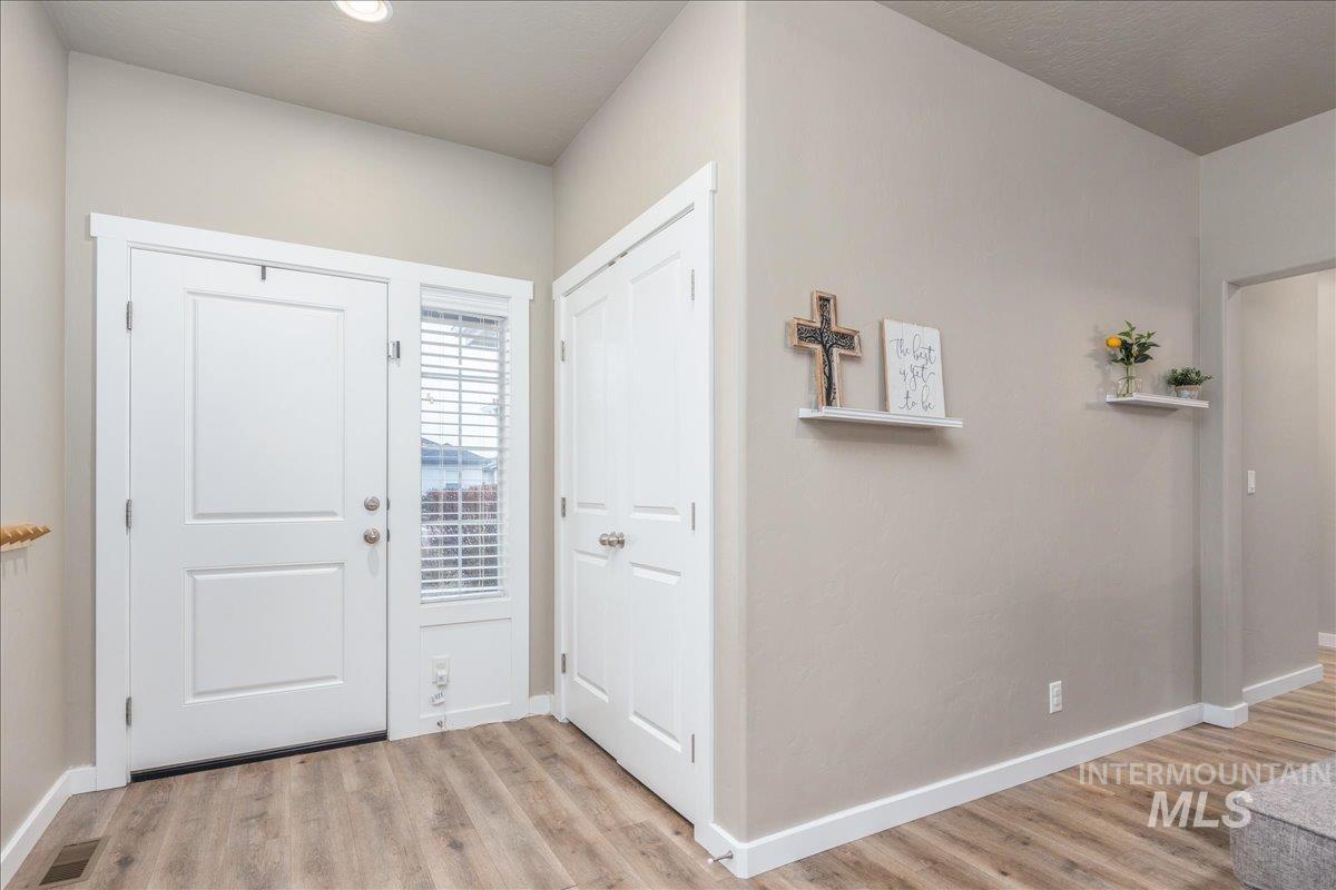5668 West Old Ranch Street Boise, ID 83714 - Photo 6 of 44 Entrance foyer with light wood-style floors