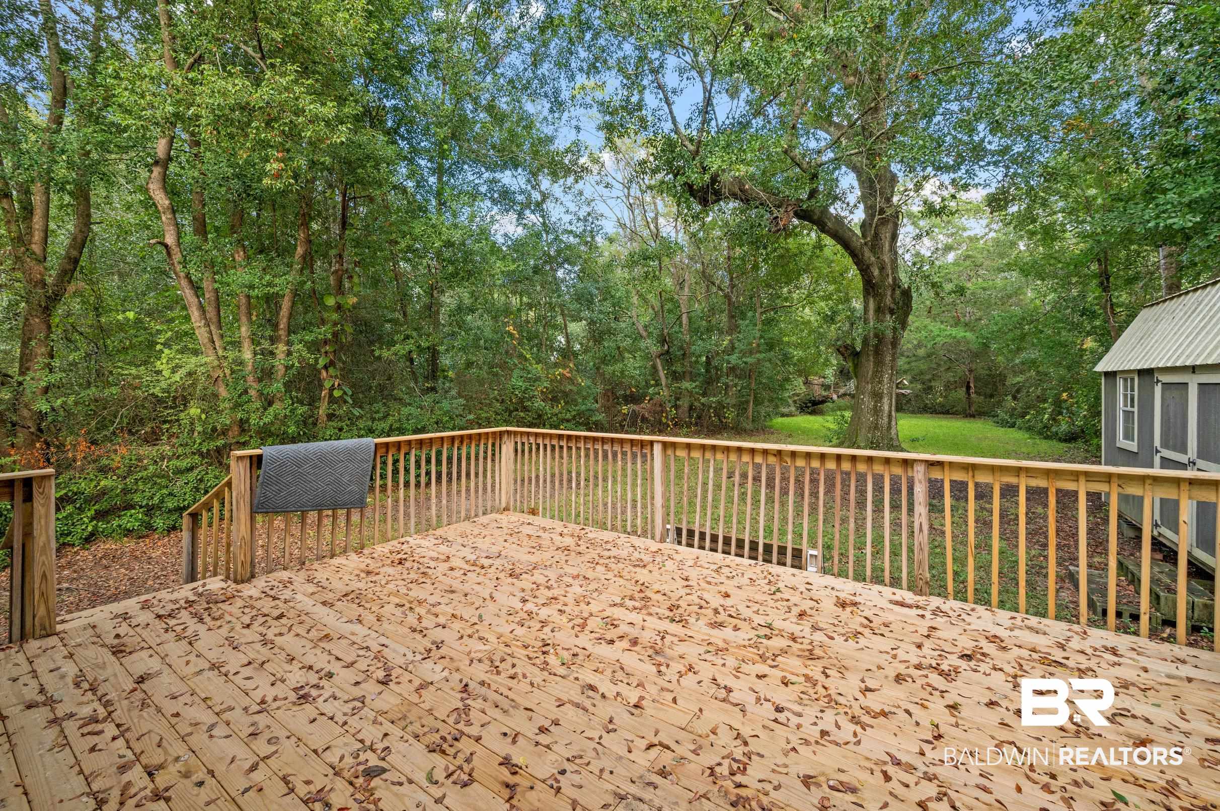 906 North Cedar Street Foley, AL 36535 - Photo 22 of 24 View of wooden terrace