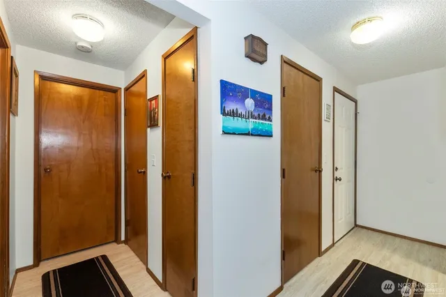 a bathroom with a mirror and a shower